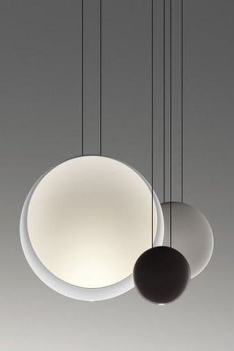 COSMOS is a pendant collection composed of several lacquered thermoplastic discs suspended at varying heights to create the appearance of satellites orbiting a moon. Circle Lights, Moon Pendant Light, Eclectic Lighting, Modern Ceiling Lights, Modern Pendant Lighting, Contemporary Ceiling Light, Contemporary Ceiling, Circle Light, Round Light