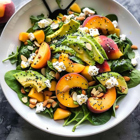 Refreshing Summer Peach Spinach Salad with avocado, toasted almonds, and goat cheese. Perfect for a healthy summer meal. Spinach Salad With Avocado, Salad With Avocado, Goat Cheese Recipes, Fresh Salad Recipes, Summer Meal, Fresh Salad, Healthy Summer Recipes, Easy Salad Recipes, Spinach Salad