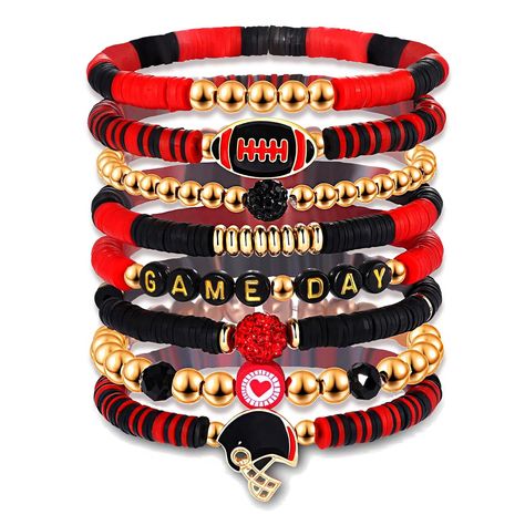 PRICES MAY VARY. ღ Game Day Bracelet: Finish off your game day outfits with our heishi bracelet set. Make a statement and celebrate your team's kickoff in style with these clay beaded stretch bracelet in your team colors, features football team colored disc clay beads, massage ‘GAME DAY’ and football charms, helmet charms and jersey charms strung on elastic bands. The perfect football accessories for sororities, college football games, high school or youth football games, and youth or high schoo Heishi Bracelets, Outfits Jewelry, Bracelets Red, Layering Bracelets, Football Bracelet, Vinyl Disc, Heishi Bracelet, Boho Style Bracelets, Football Accessories