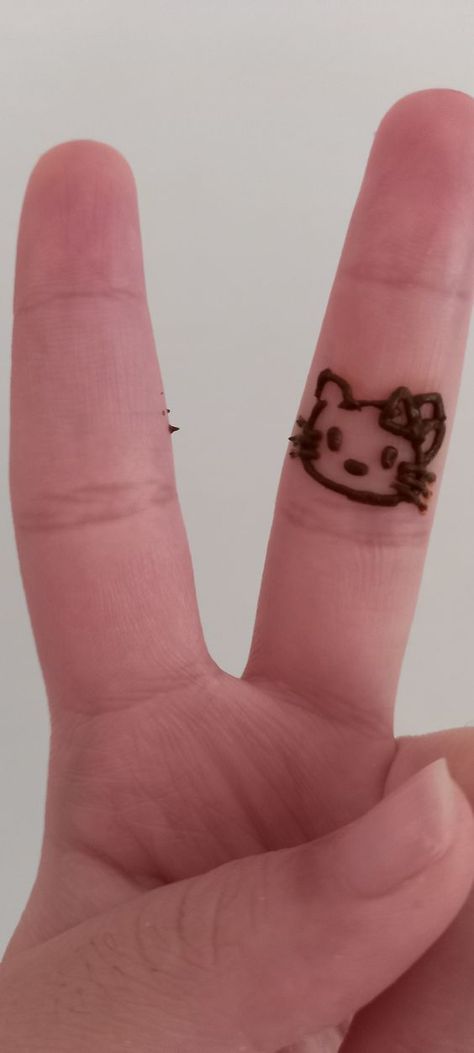 Hello Kitty Henna- by Shreya Kawaii Henna Designs, Hello Kitty Henna Design, Henna Designs Hello Kitty, Henna Hello Kitty, Hello Kitty Henna, Coquette Henna, Minimalistic Henna, Dainty Henna, Minimalist Henna