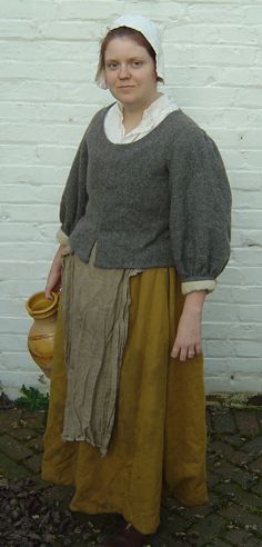 Typical 17th century peasant clothing, as interpreted by historical reenactor. 17th Century Dress Peasant, Funny Maternity Photography, The Tudors Costumes, 17th Century Dress, Peasant Clothing, 17th Century Clothing, Maternity Photography Family, 17th Century Fashion, Tudor Costumes