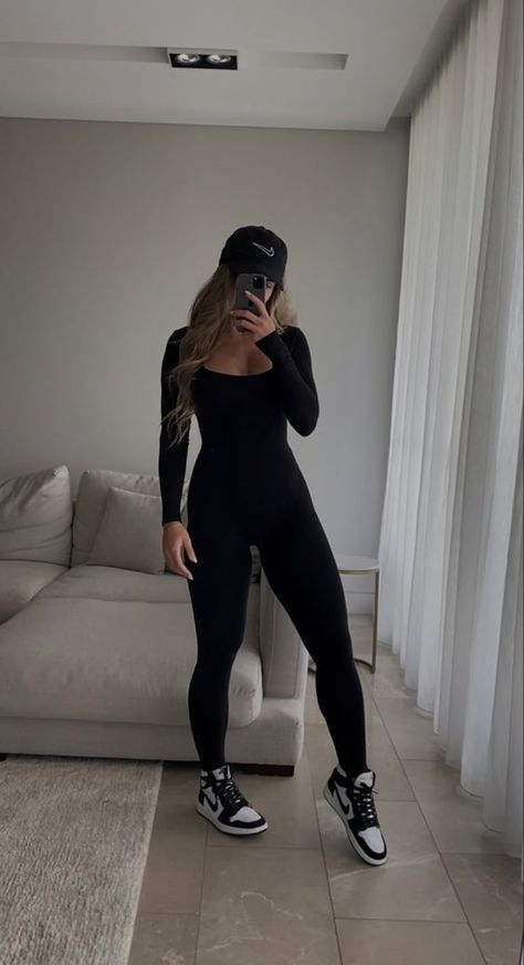 (JUMPSUIT LINK ABOVE ONLY £12.99  and comes in different colour) black jumpsuit outfit activewear casual style nike jordan aesthetic fitcheck Sporty Outfit Inspiration, Black Jumpsuit Outfit With Jordans, Casual Sporty Outfits Fall, Black All In One Jumpsuit, Body Suit And Sneakers Outfit, Sporty Black Outfits, Jumpsuit And Dunks Outfit, Black Body Jumpsuit Outfit, All Black Outfit With Jordans