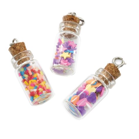 "Find the Color Bottle Charms by Creatology™, 3ct. at Michaels. This filled bottle charm set is guaranteed to add a quirky vibe to your jewelry creations. This filled bottle charm set is guaranteed to add a quirky vibe to your jewelry creations. Use the charms to transform bracelets, necklaces, and more! Details: Includes bottle in assorted colors 0.59\"×1.18\" (15mm×30mm) charm size 3 charms Glass, PVC, cork, alloy, and iron For ages 4 and up | Color Bottle Charms by Creatology™ 3ct. | Michaels Red Polish, Mini Glass Bottles, Red Nail Designs, Bottle Charms, Picture Puzzles, Red Prom, Prom Nails, Charm Set, Nails Acrylic