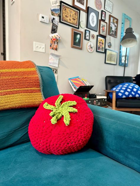 Plush giant heirloom tomato crocheted with soft yarn and stuffed with a pillow. Makes for a great decorative pillow on a couch or chair! Perfect for summer decorations around the house. Measures approximately 7 inches tall by 12 inches across. Crochet Tube Pillow, Tomato Pillow, Tomato Crochet, Crochet Pillow Case, Crochet Pillow Cases, Tomato Girl, Summer Decorations, Worm Farm, Heirloom Tomato