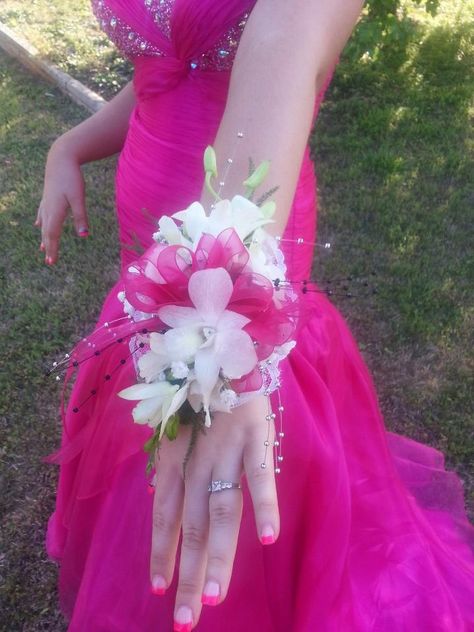 white dendro orchid corsage Bright Pink Prom Dress, Corsage For Prom, Pink Corsage, Homecoming Flowers, Prom Corsages, Homecoming Corsage, Hot Pink Prom Dress, Neon Prom Dresses, Diy Corsage