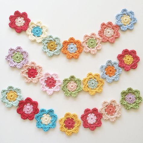 “These are super simple 3 round flowers. You can use them to make a garland or a bunting. You can join them together to make a scarf, shawl or blanket. This a perfect project to use up odd bits of yarn leftover from other projects.” Crochet Flower Bunting Free Pattern, Crochet Flower Garland Pattern Free, Make A Garland, Crochet Plants, Sewing Journal, Round Flowers, Crochet Choker, Beau Crochet, Crochet Bunting