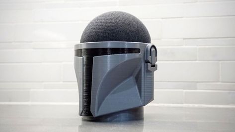 You Can Masquerade Your Echo Dot As The Mandalorian Helmet With This 3D Printed Stand | SHOUTS The Mandalorian Helmet, Nerd Room, Resin Printing, 3d Printer Ideas, Mandalorian Helmet, Amazon Echo Dot, 3d Printing Business, 3d Print Ideas, Maker Ideas