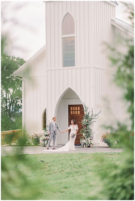 The Perfect White Wedding Chapel inspired by the french countryside. The Highlands Chapel at Howe Farms near Chattanooga, Tennessee. Wildflowers everywhere! Just imagine if this was surrounded by lavender fields. #frenchwedding #frenchcountryside #cleanwhitewedding #springweddingideas #purpleweddingaccents #lavenderwedding #frenchlavender #lavenderandbabyblue Howe Farms, White Wedding Chapel, Glass Chapel, Wedding Ring Shots, Little White Chapel, White Chapel, Chattanooga Wedding, Custom Chandelier, Beautiful Farm