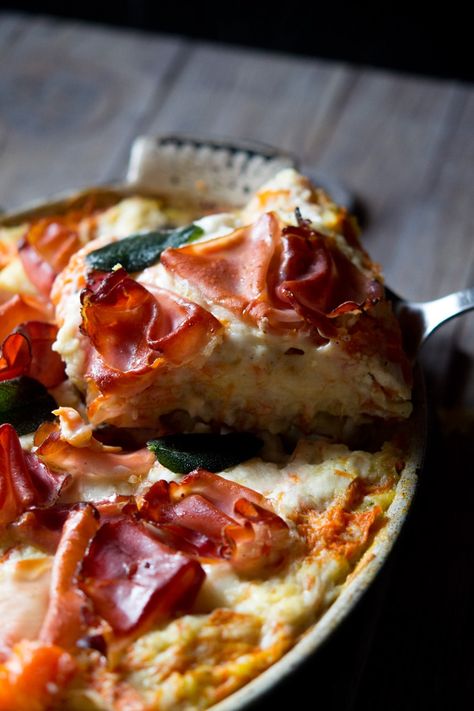 A close up shot of a slice of butternut squash lasagna topped with prosciutto Sage Lasagna, Prosciutto And Goat Cheese, Butternut Squash Lasagna Recipe, Lasagna Bolognese, Winter Squash Recipes, Potassium Foods, Butternut Squash Lasagna, Squash Lasagna, Autumn Dinner