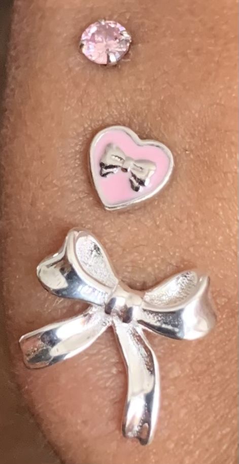 coquette earrings jewlery girly pink lana del rey bow earrings heart earrings pink diamonds pink accessories trending bow trend coquette aesthetic Pink Lana Del Rey, Coquette Earrings, Bow Trend, Earring Stacks, Bow Earring, Earring Stack, Pink Diamonds, Pink Accessories, Earrings Heart