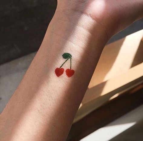 Heart shaped cherry tattoo on the wrist | www.otziapp.com Tattoo On Buttcheek, Tattoo Planets, Fernweh Tattoo, Cherry Tattoo, Orca Tattoo, Tato Minimal, Tato Jari, Pola Tato, Sanskrit Tattoo