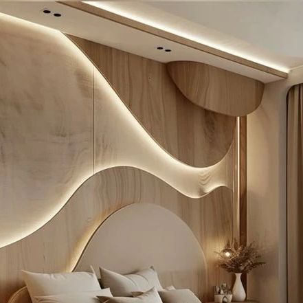 NS Interiors | Delhi on Instagram: "Parametric style bedroom!  • Curvy lines on bed wall woth cove light • Wooden touch with minimal tones  Follow- @_ns_interiors for amazing designs and concepts   Pc- @pinterestindia   #interior #interiors #interiordesign #interiordesigner #interiordesignerslife #interiordecor #decor #design #designerofinstagram #homedecor #home #styling #homestyling #furniture #furnituredesigner #furnituredesign #designer #interiordesignideas #interiorstyling #designers #igdesign #designforinstagram #igers #instagood #interiorarchitecture #workinprogress #sitework #interiorstyling #interiorart #ns_interiors" Parametric Bedroom Design, Squiggle Light On Wall, Cove Light, Pediatric Clinic, Parametric Wall, Curved Bed, Cove Lighting, Bed Design Modern, Architectural Section