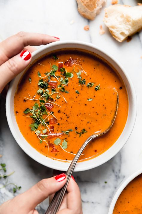 The easiest homemade Creamy Roasted Red Pepper Soup recipe! 10 simple ingredients, including roasted red peppers, crushed tomatoes, & almond milk create a beautiful velvety soup, without the use of any dairy. This cozy soup is completely vegetarian, dairy-free & vegan, & it takes less than 25 minutes to make. #souprecipes #easysouprecipes #healthysouprecipes #vegansoup #veganrecipes #vegetarianrecipes Roasted Pepper Soup, Vegan Cheese Substitute, Cozy Soup, Roasted Red Pepper Soup, Red Pepper Soup, Plant Milk, Soup Vegan, Pepper Soup, Vegan Healthy