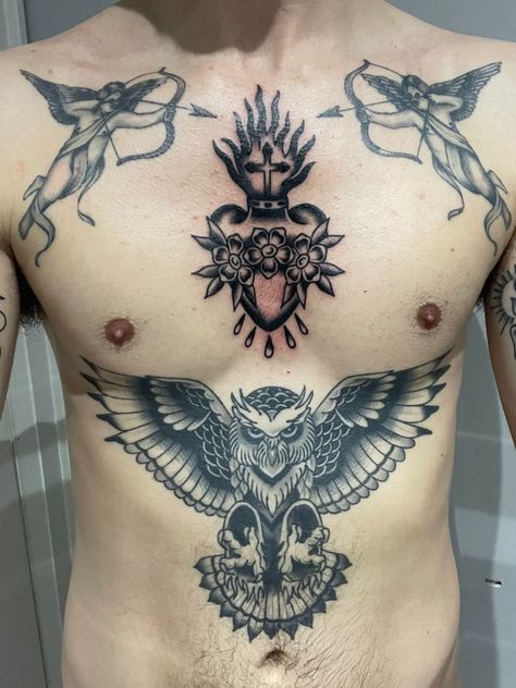 Men's Chest Tattoos: From Traditional to Modern Styles" Traditional Chest Piece Tattoo Men, Tradition Chest Tattoo, Owl Stomach Tattoos Men, Sacred Heart Tattoo On Chest, Sacred Heart Chest Tattoo Men, Traditional Tattoos Chest Piece, American Tradition Chest Tattoo, Elbow Scar Tattoo Cover Up, Sacred Heart Chest Tattoo Female