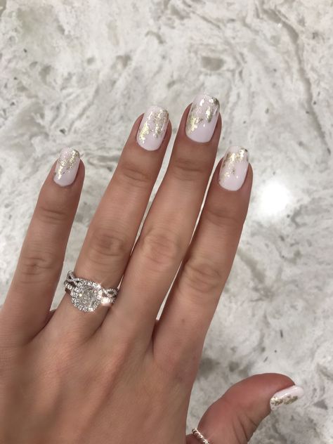 Gold foil nails #nails #naildesign #engagementring #style #nailart #whitenails White And Silver Foil Nails, White With Foil Nails, Biab Nails Gold Foil, Nails With Foil Flakes Silver, White Silver And Gold Nails, Winter Foil Nails, White Gold Foil Nails, White And Gold Flake Nails, White Nails With Silver Foil