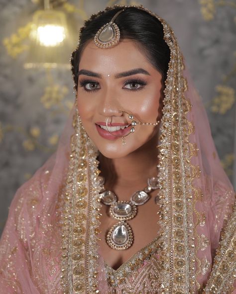 Unfiltered, straight from my magic wand to your screen ! 🪄 Pastel bridal look made Umang look nothing less than a goddess 🪷✨ Delhi-inspired bridal allure, this Anand karaj ensembles a vision of pastel-perfected detailing. 💕 The delicate glow of sheer skin and flushed cheeks complemented by Komal hire’s signature glamorous eye look, magic unfolds before your eyes. 💫 Makeup: 💁🏼‍♀️ Hair: @sabahairstylist Beauty: @_umang4 Shot by: @aanchal_oberai Cosmetics: @r.venterprises Anand Karaj Hairstyles, Desi Bridal Makeup, Asian Bridal Hair, Flushed Cheeks, Anand Karaj, Pakistani Bridal Makeup, Bridal Makeup Images, Makeup Images, Desi Wedding Dresses