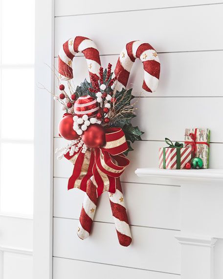 CHRISTMAS DECOR Get a jump start on the season! Find stunning Christmas decor, from faux florals and garlands to gorgeous topiaries, ornaments and gingerbread houses. We'll be hand-selecting a bright and fun selection of Christmas stockings, pillow covers, bedding Santa's and Angels. Check back and browse through a gorgeous collection of Christmas home decor. Bright Christmas Decorations, Christmas Candy Cane Decorations, Candy Cane Crafts, Candy Cane Decorations, Red And White Christmas, Candy Christmas Decorations, Christmas Door Decorations, Candy Land Christmas, Christmas Wreaths Diy