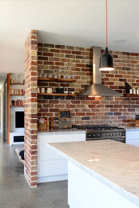 Eco home showcasing a recycled brick splashback in their kitchen to add warmth and style. Red Brick Kitchen, Kitchen Feature Wall, Small Floor Plans, Metal Building Home, Recycled Brick, Loft Kitchen, Brick Kitchen, Instagram Kitchen, Bar Basement