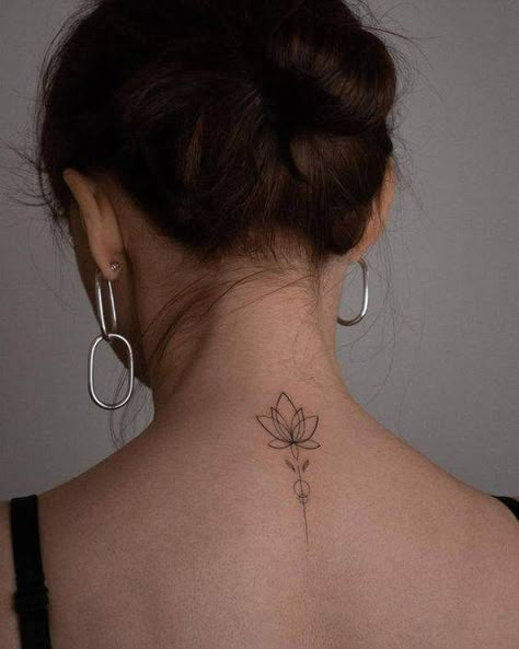 20 Elegant Mini Nape Tattoos To Bring Out Your Beauty Back Of Neck Feminine Tattoo, Nape Neck Tattoos Women, Small Nape Tattoo, Dainty Minimalist Tattoo, Women Tattoos Neck, Nape Tattoo Women, Minimilastic Tattoos Women, Nape Tattoo Women Minimalist, Small Tattoos On Neck