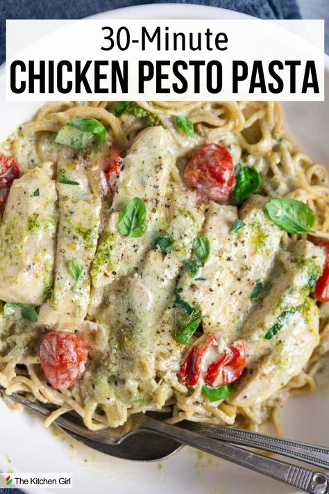 Creamy chicken pesto pasta in white bowl with fork and spoon. Title: 30 minute chicken pesto pasta. Pesto And Chicken Pasta, Chicken With Pesto Pasta, Chicken Basil Pesto Pasta Recipes, Recipe With Pesto In It, Lemon Pesto Chicken Pasta, Pesto Pine Nut Pasta, Recipes Using Pesto Sauce, Chicken Tomato Pesto, Chicken Pesto Pasta Recipes