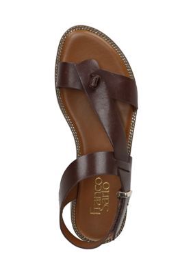 These simple strappy sandals with a hidden thong strap are the perfect weekend style. Leather upper. Adjustable hook-and-loop closure. Open round toe with hidden thong strap. Crisscross strap vamp. 0.79 inch stacked heel. | Franco Sarto Women's L-Glenni Putty Sandals, Dark Brown, 11M Tan Sandals Outfit, Thong Sandals Outfit, Brown Sandals Outfit, Sandals Outfit, Leather Thong Sandals, Brown Leather Sandals, Flip Flop Shoes, Famous Footwear, Franco Sarto Shoes