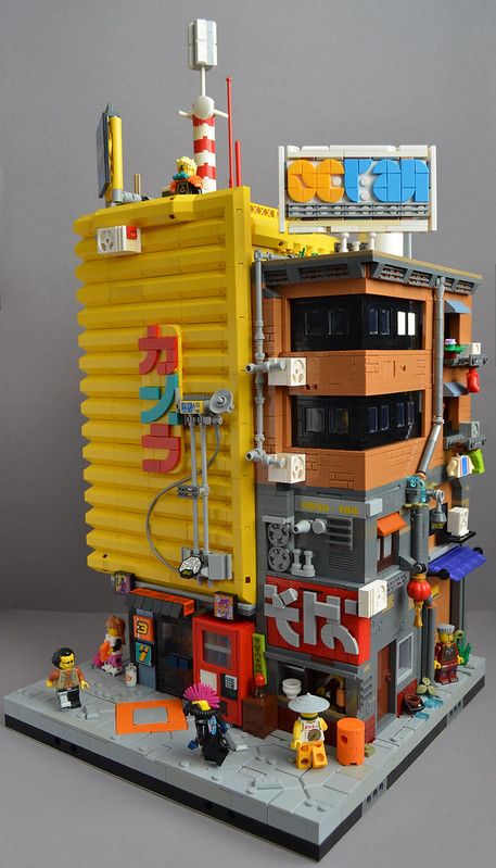 Nakano Camera Corner - front right | The Nakano Camera Corne… | Flickr Lego Cyberpunk, Lego Ninjago City, Ninjago City, Noodle Shop, Lego House Ideas, Lego Designs, Motion Ideas, Lego Spiderman, Big Lego