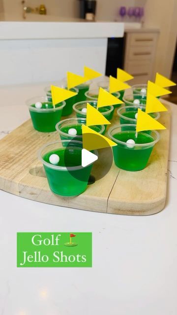 Jessica Neff | Holiday Recipes | Cocktail Recipes on Instagram: "Golf Jello Shots ⛳️ SO fun for The Masters ⛳️   Comment “Golf” and I will send you direct message to shop this post. ⛳️💚😘  1 box of Lime @jello  1 box of Green Apple @sonicdrivein Jello 1/2 cup tequila @patron  1/2 cup @wheatleyvodka  1 cup of boiling water  Jello shot cups @heb  Flags @amazon  Sixlets @sixletsofficial   Make sure to put the Jello Shots in the refrigerator for  2 hours before adding the flags and sixlets on top. 💚  SO easy to make 🙌🏻  Add COLD water instead of alcohol to make these  kid friendly. ⛳️🙌🏻💚  Enjoy ⛳️💚  #jello #jelloshots #jelloshot #golf #golflife #golfclub #golfstagram #golfparty #golfislife #golfbabes #partyideas #partyinspiration #boybirthday #greenapple #lime #tequilacocktails #vodkad Golf Jello Shots Recipe, Golf Shots Alcohol, Golf Themed Jello Shots, Golf Inspired Cocktails, Green Jello Shots Recipe, Golf Jello Shots, Golf Party Ideas For Men, Jello Shots Green, Golf Food Ideas