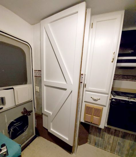 Installing A Barn Door In A Camper - Truck Camper Magazine Acordian Doors, Barnyard Door, Bathroom Barn Door, Camper Bathroom, Camper Diy, Camper Truck, White Barn Door, Vintage Camper Remodel, Rv Bathroom