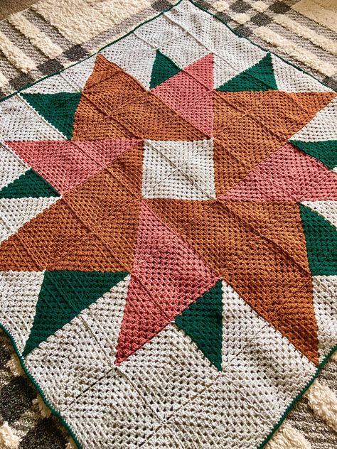 I've been absolutely in love with designing quilt-style crochet blankets for several years now. Typically these have been done with smaller pieces, so for this one I wanted something large scale. Each square is approximately 9 inches (23 cm). This crochet blanket was inspired by large quilt blocks that you might see on the side of a barn. Pattern Details Skill Level: Beginner Hook Used: Uses a 6mm/J crochet hook. If you choose to go up or down in yarn weight, adjust your hook size according to y Complicated Crochet Blanket, Aztec Granny Square Crochet, Christmas Granny Square Blanket, Scrap Crochet Blanket, Two Color Granny Square, Geometric Crochet Blanket, Modern Granny Square Blanket, Crochet Picnic Blanket, Granny Square Variations