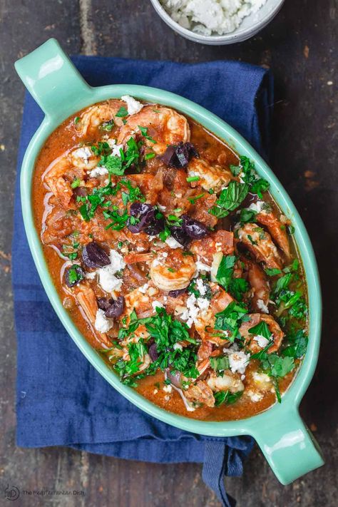 Shrimp saganaki (Greek shrimp in tomato sauce) is an effortlessly elegant dish that only takes 30 minutes. It will wow your tastebuds (and your friends)! Shrimp In Tomato Sauce, Mediterranean Diet Snacks, Greek Shrimp, Tomato And Feta, Traditional Greek Salad, The Mediterranean Dish, Juicy Shrimp, Greek Flavors, Shrimp Recipes Easy