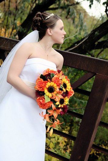 Love the sunflowers and the roses. Maybe white or off-white roses instead of orange. Probably no tiger lillies Orange Lilies, Sunflowers Roses, Yellow Wedding Bouquet, Floral Bouquets Wedding, Gorgeous Bouquet, Autumnal Wedding, Fall Bouquet, Sunflower Wedding Bouquet, Sunflower Themed Wedding