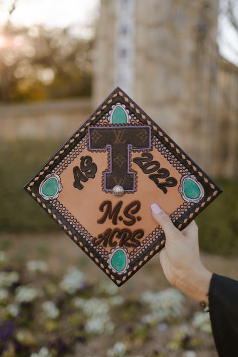 artist: willie brown Leather Grad Cap, Western Graduation, High School Graduation Pictures, Senior Things, College Grad Cap Ideas, Handmade Leather Work, Graduation Cap Decoration Diy, Senior Szn, Custom Leather Work