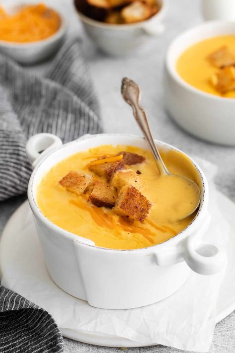 This Cheddar Cheese Soup is a classic cheese soup recipe, and it’s made completely on the stovetop. Enjoy! Gluten Free Cheddar Cheese Soup, Canadian Cheese Soup, Cheddar Cheese Soup Recipes, Cheese Soup Crockpot, Wisconsin Cheese Soup, Soup Store, Cheese Soup Recipe, Creamy Tomato Basil Soup, Cheese Soup Recipes