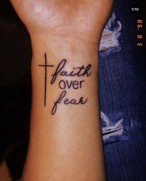 Faith Over Fear Tattoo, Wrist Tattoos Words, Fear Tattoo, Lotusblume Tattoo, Tattoos For Women Small Meaningful, Meaningful Wrist Tattoos, Bible Tattoos, Cross Tattoos For Women, Pretty Hand Tattoos