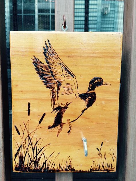 Duck wood burn hook game.  #woodburning #pyrography #stain Duck Wood Burning, Wood Burn Fish, Large Pyrography Art, Crow Pyrography, Pyrography Scenery, Hook Game, Wood Burning Tips, Wood Burn Spoons, Wood Burning Stencils