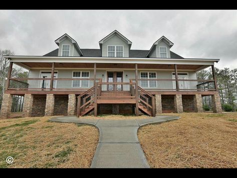 Front elevated porch! #remodelingourhome Elevated Ranch Style Homes Exterior, Elevated Porch Landscaping, Raised House Landscaping, Raised House Design, Elevated Front Porch Ideas, Raised Front Porch, Elevated Front Porch, Tall Front Porch, Rap Around Porch