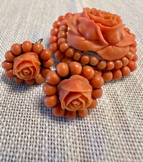 Gorgeous Brooch & Earrings carved salmon Coral rose set-Victorian.  Condition is very good for their age, earrings converted to screw back probably in the early 1900s, pictures show the details.  Brooch approx . 1 1/2" by 1 1/4", earrings diameter approx 3/4", tests for 14k gold, wt.- for set 22.8 grams.  Flowers take never die, Wonderful to find set intact, can be worn separately or together -a vision of loveliness. 1900s Pictures, Pearl Bangles Gold, Coral Jewelry Vintage, Coral Jewelry Set, 4 Earrings, Coral Rose, Coral Design, Beaded Jewelry Necklaces, Pearl Bangle