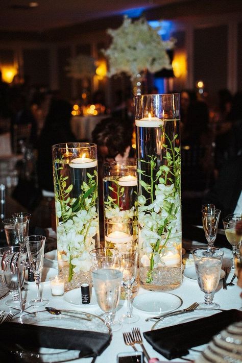 If you're searching for trending wedding ideas on Pinterest or wedding blogs, you must have seen some spectacular floating wedding centerpieces with candles or Submerged Flowers, Cheap Wedding Table Centerpieces, Candles And Flowers, Wedding Candles Table, Florida Destination Wedding, Wedding Motifs, Unique Wedding Flowers, Wedding Floral Centerpieces, White Florals