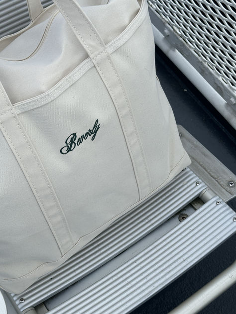 Iconic Boat & Tote Bag from LL Bean! Obsessed with this for travel, duffle, weekender, beach, pool, and work bag. It really is an everything bag! Lol Bean Tote Bag, Ll Bean Tote Bag, Poolside Aesthetic, Ll Bean Tote, Best Travel Tote, Boat And Tote, Totes Ideas, Boat Bag, Summer Tote Bag