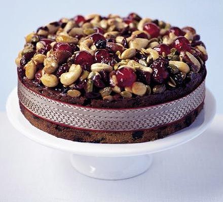 If you’re not keen on icing and marzipan, bake a crown of toasted nuts, seeds and juicy cherries onto your cake instead Seed Bars Recipe, Christmas Fruitcake, Seed Cake, Fruit Cake Christmas, Basic Cake, Fruitcake Recipes, Christmas Cake Decorations, Christmas Fruit, Christmas Cake Recipes