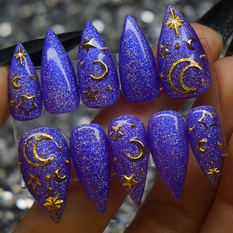 Sydney Petty on Instagram: "#glitternails #blingnails #pressonnails #purplenails #stilettonails #witchynails #witchnails #halloweennails #holonails" Witchy Stiletto Nails, Wiccan Nails, Occult Nails, Boogie Nails, Magical Nails, Almond Acrylic Nails Designs, Beauty Land, Nail Piercing, Witch Nails