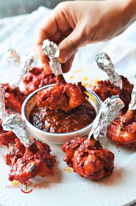 How to make Chicken Lollipop from Wings + VIDEO | Chicken Lollipop Recipe (Baked) » Foodies Terminal Chicken Lollipops Recipe Indian, Wings Video, Chicken Lollipop, Spicy Baked Chicken, Lollipop Recipe, Schezwan Sauce, Chicken Lollipops, Indian Chicken Recipes, Quick Chicken Recipes