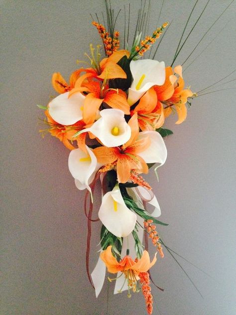 Cream Ivory calla lily with orange small tiger lily cascade bouquet Tiger Lily Bouquet, Peter Pan Wedding, Lily Plant Care, Teal Wedding Colors, Wedding Cake Fresh Flowers, Calla Lily Bouquet, Lily Bouquet, Cascade Bouquet, Fall Wedding Bouquets