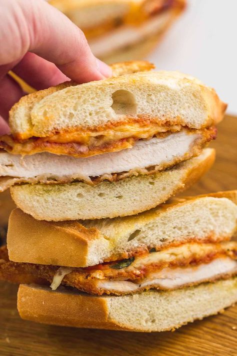 This Chicken Parmesan Sandwich is just like the Cheesecake Factory’s, featuring fried chicken cutlets, marinara sauce, and melty cheese on grilled french bread. Parmesan Sandwich, Chicken Parmesan Sandwich, Cheesecake Factory Copycat, Chicken Marinara, Fried Chicken Cutlets, Meatball Dinner, The Cheesecake Factory, Melty Cheese, Italian Cheese