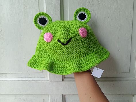 Crochet frog bucket hat Frog Bucket Hat Crochet, Frog Crochet Hat, Crochet Frog Bucket Hat, Crochet Bucket Hat Free Pattern, Easy Crochet Bucket Hat, Crochet Frog Hat, Frog Bucket Hat, Toddler Bucket Hat, Frog Hat