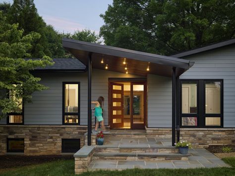 These homeowners loved the interior of their Baltimore County home, but desired a more stunning curb appeal. Laurie Stubb, Place Architecture was able to offer the perfect design to meet the owners needs. Owings Brothers built the project with CertainTeed Fiber Cement siding, new standing seam, metal roof with black gutters, new black narrow profile … Modern Front Porches, Mid Century Modern Exterior, Modern Porch, Ranch House Exterior, Mid Century Exterior, Ranch Exterior, Building A Porch, Entry Design, Front Porch Design