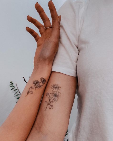 Tattoo artist: Alina Meshadi Minimal Chrysanthemum Tattoo, Marigold Wrist Tattoo, Marigold Fine Line Tattoo, Dainty Marigold Tattoo, Fine Line Chrysanthemum Tattoo, Chrysanthemum Tattoo Small, Marigold Flower Tattoo, Chrysanthemum Flower Tattoo, Flower Tats