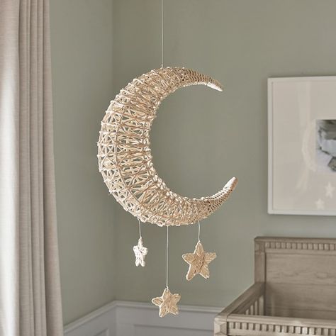 Add a touch of boho charm with our moon and stars mobile. Crafted of handwoven rattan, it adds natural texture and celestial dimension to their space. DETAILS THAT MATTER Mobile is made of wrought iron. Features unique details of moon and stars design made of Rattan. Finished in a hand painted oil-based, semi-gloss paint. Can be mounted on dry wall. KEY PRODUCT POINTS Pottery Barn Kids exclusive. Hardware is not included. Wipe clean. Imported. Star Themed Nursery, Stars Mobile, Moon Mobile, Moon Nursery, Star Mobile, Nursery Room Inspiration, Star Nursery, Pottery Barn Teen, Moon And Stars