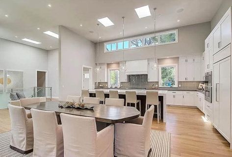 Kitchen with clerestory windows high ceiling and skylights Kitchen Tall Ceilings, Double Height Windows Living Room, Clerestory Windows Living Rooms, Clere Story Windows, Kitchen Clerestory Windows, Tall Ceiling Kitchen, High Ceiling Kitchen, Window Over Kitchen Sink, Huge Skylight