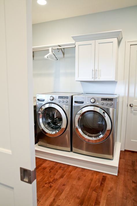 Built In Pedestal Washer And Dryer, Shiplap Behind Washer And Dryer, Raise Washer And Dryer Diy, Laundry Room Washer Dryer Pedestal, Laundry Room Makeover With Pedestals, Built In Washer And Dryer Pedestals, Raised Washer And Dryer Ideas Diy, Laundry Room Ideas With Raised Washer And Dryer, Laundry Room Ideas Raised Washer Dryer